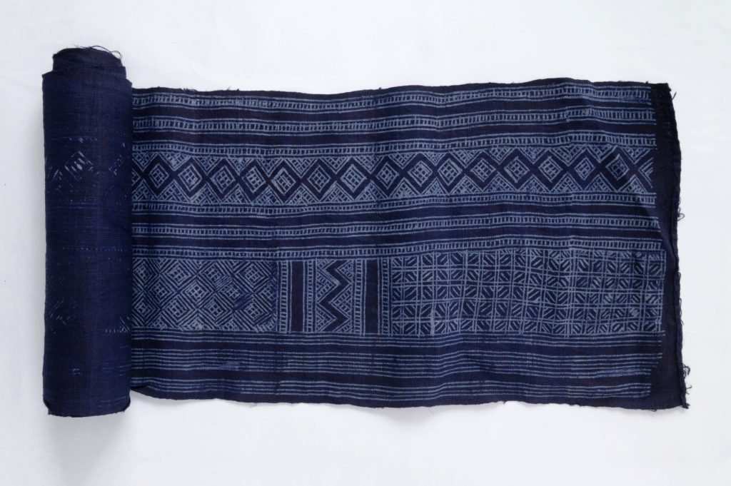 Hmong wax resist batik indigo blue fabric roll Laos